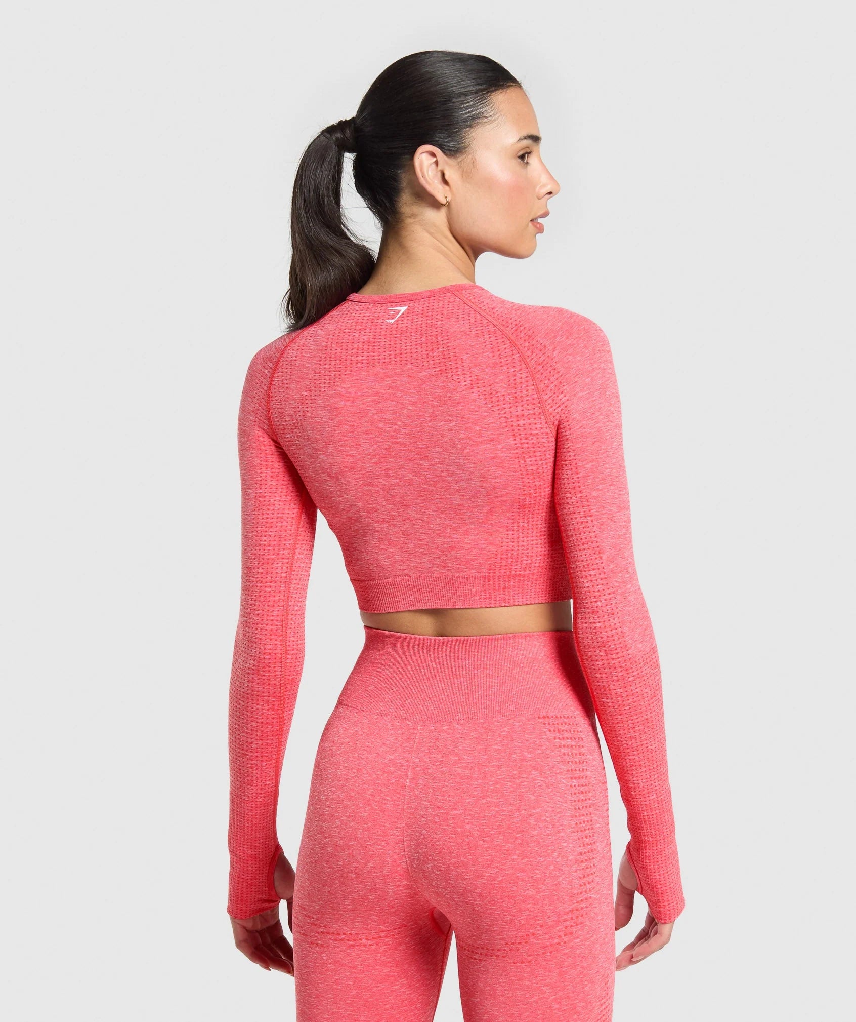 VitalSeamless2_0CropTopGSCoralRed-MarlB1A3D-RB0Z6_3840x_jpg.webp